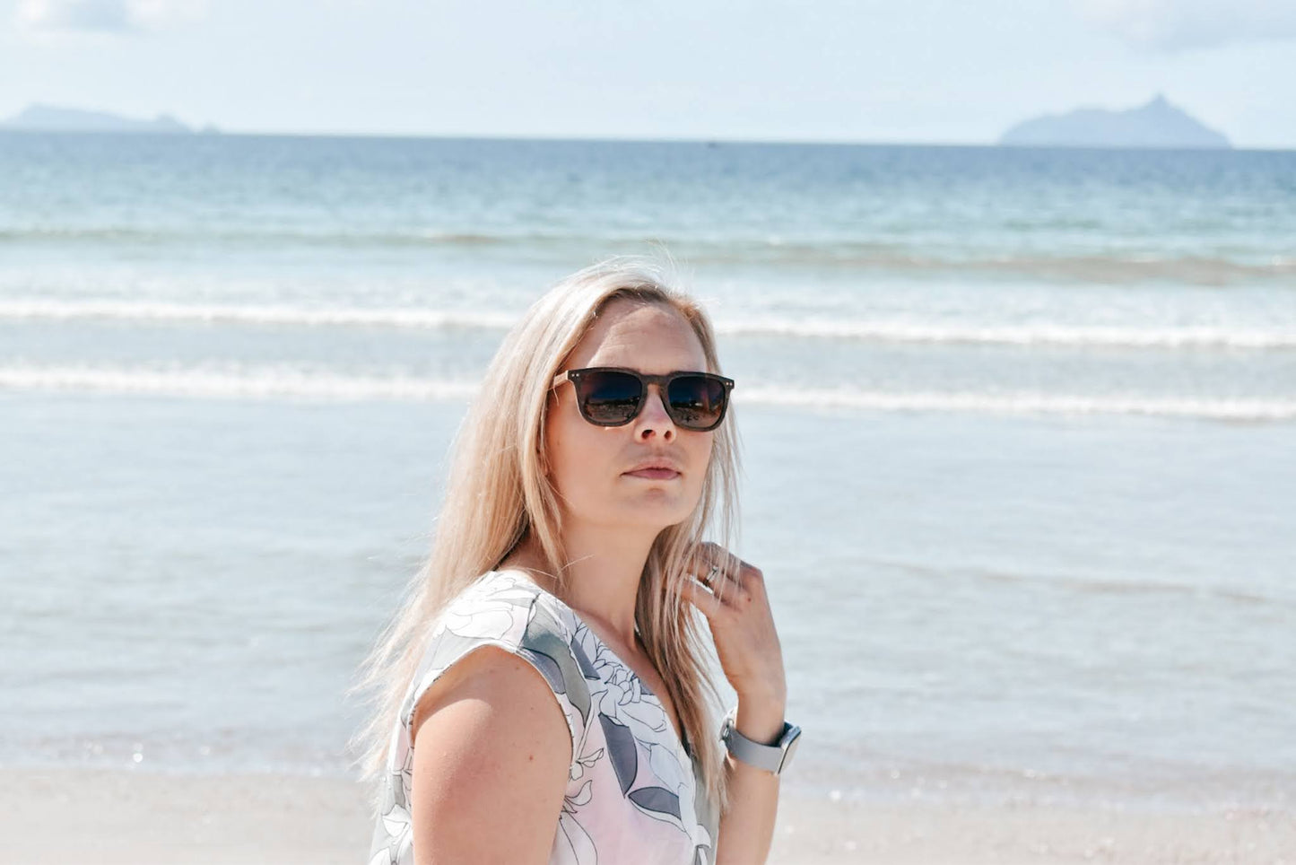 Woman wearing Vilo Angelou Wooden Sunglasses on the beach